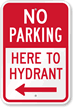 No Parking Here To Hydrant Left Arrow Sign